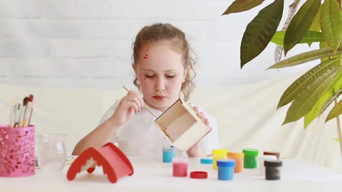 Creative child paint with blue paint from a jar Stock Footage 158172613