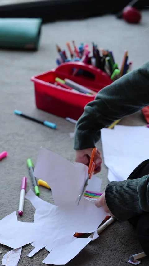 Creative Child uses Scissors Stock Footage 317762447