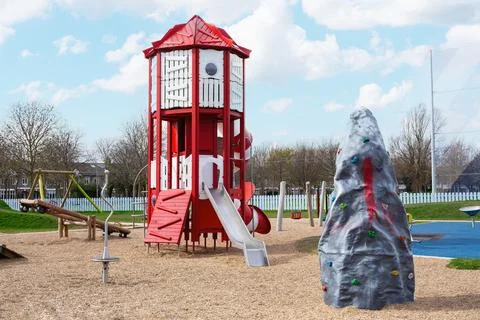 Creative Children Playground With Rocket Slide And Climbing Wall Stock Photos