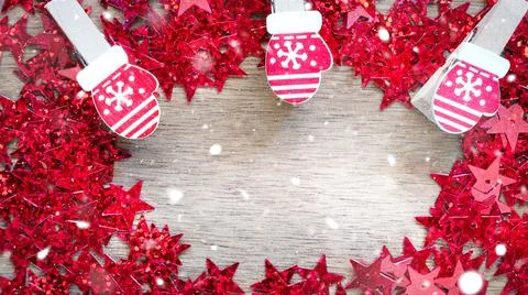 Creative Christmas background with red sequins stars with copy space. Stock Photos