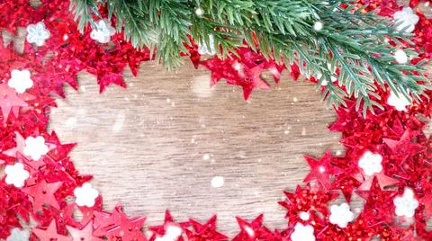 Creative Christmas background with red sequins with copy space. Stock Photos