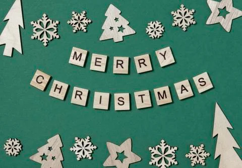 Creative Christmas flat lay composition, inscription Merry Christmas made of Stock Photos