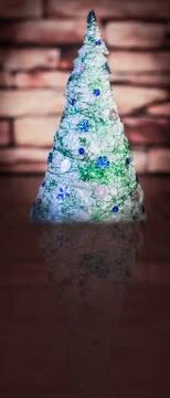 Creative Christmas tree on .the brick background Stock Photos