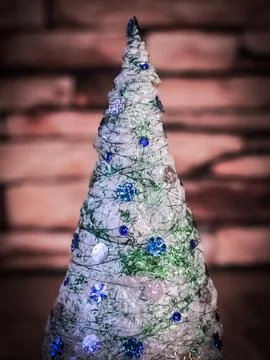 Creative Christmas tree on .the brick background Stock Photos