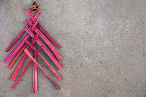 Creative christmas tree made from chard stalks isolated on old metal brown Stock-Fotos