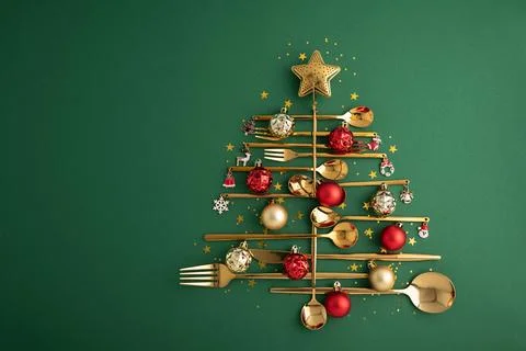 Creative Christmas Tree Made From Golden Cutlery Decorated With Ornaments A.. Stock Photos