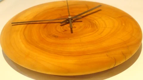 Creative clock, made on a round board Vídeos de archivo 74619140
