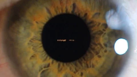 Creative close up eye with reflex on pupil Stock Footage 128919686