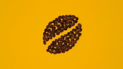 Creative coffee drink concept stop motion video with coffee beans on yellow. Stock Footage 237797637