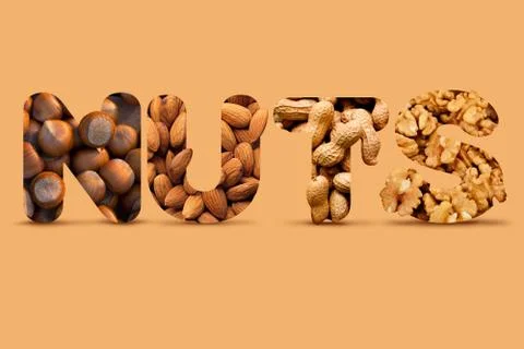 Creative Collage Made Of Different Nuts: Hazelnut, Almond, Peanut, Walnut Wit Stock Photos