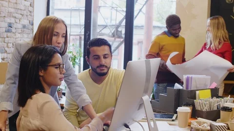 Creative Colleagues Working together in Design Agency Stock Footage