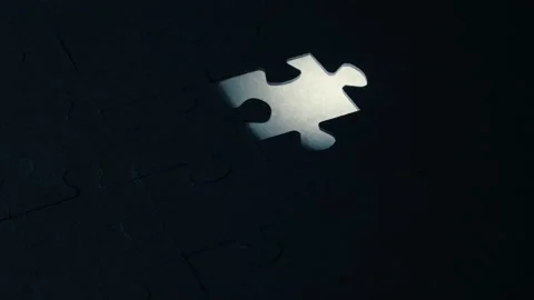 A creative completes the black or white light puzzle putting the last missing Stock Footage 220522715