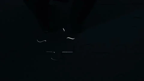 A creative completes the black or white light puzzle putting the last missing Stock Footage 221677156