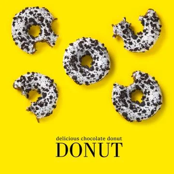 Creative composition of donuts on a yellow background. Flat lay delicious nib Stock Photos