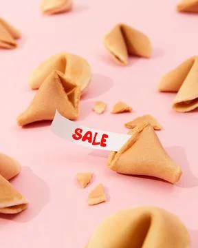 Creative composition with fortune cookies and paper with text on pink background Stock Photos