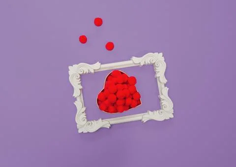 Creative composition of red fluffy balls and fashionable frame. Romantic love Stock Photos