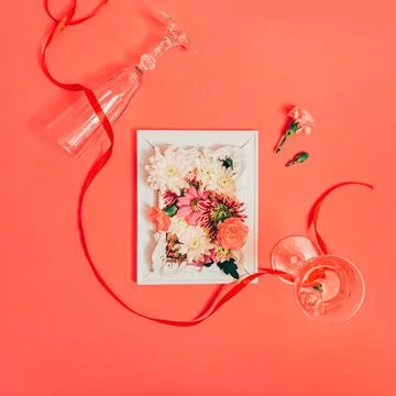 Creative composition of various flowers, champagne glasses, and renaissance Stock Photos