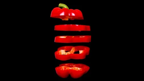 Creative concept with flying red paprika. Sliced floating pepper Video stock 122303076
