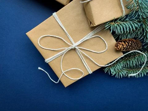 Creative concept with gift box on blue background Stock Photos