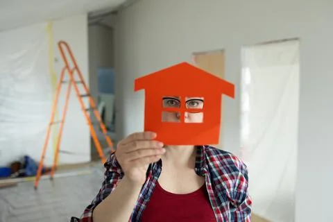 A Creative Concept for Home Renovation Featuring Artistic Paper Cutout Designs Stock Photos