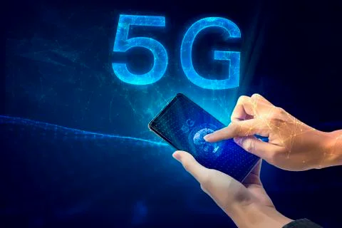 Creative connection background, mobile phone with 5G hologram on the backgrou Stock Photos