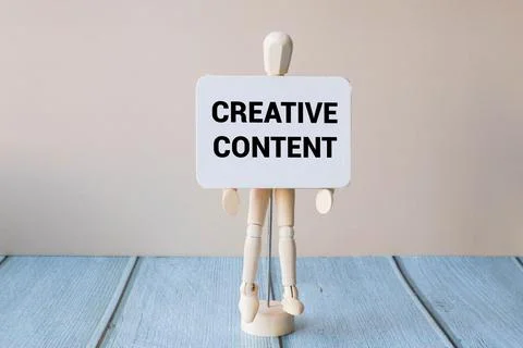 Creative Content text on paper card on blue, purple, pink geometric background. Stock Photos