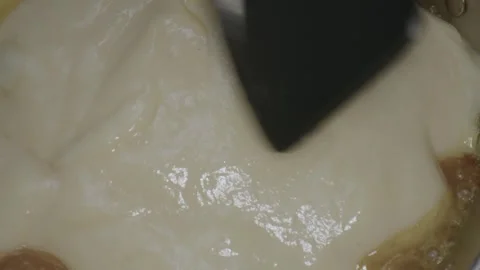 Creative cooking session unfolds in a miniature kitchen where tiny cookware is Video stock 286903226