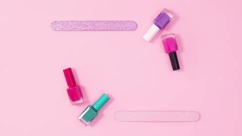 Creative copy space frame made of nail polish bottles and files. Stop motion Stock-Footage 150765871