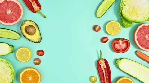 Creative copy space with sliced organic fruits and vegetables. Stop motion Stock-Footage 192470163