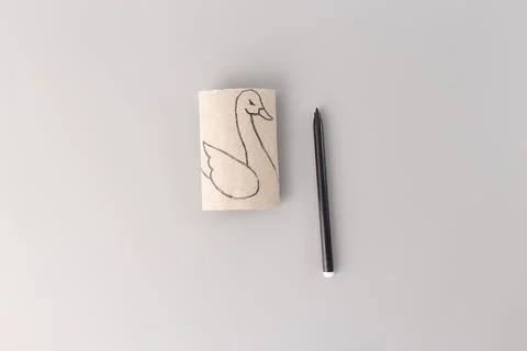 A creative craft project in progress. a pencil and drawing the outline of s.. Stock Photos