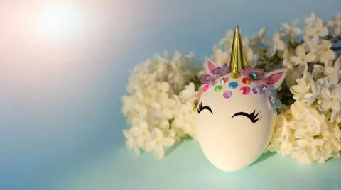 Creative decorative Easter egg in the form of a unicorn 写真素材