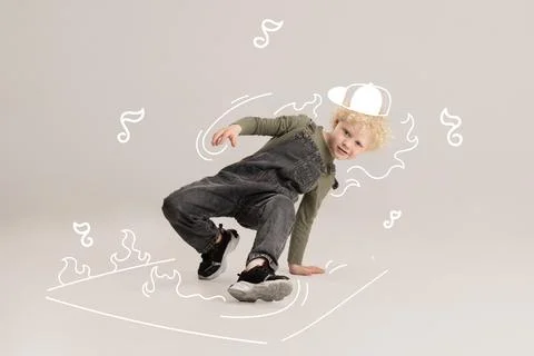 Creative design with drawn elements. Portrait of little boy, child dreaming to Stock Photos