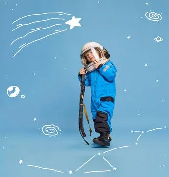 Creative design with drawn elements. Portrait of little boy, child in costume of Stock Photos