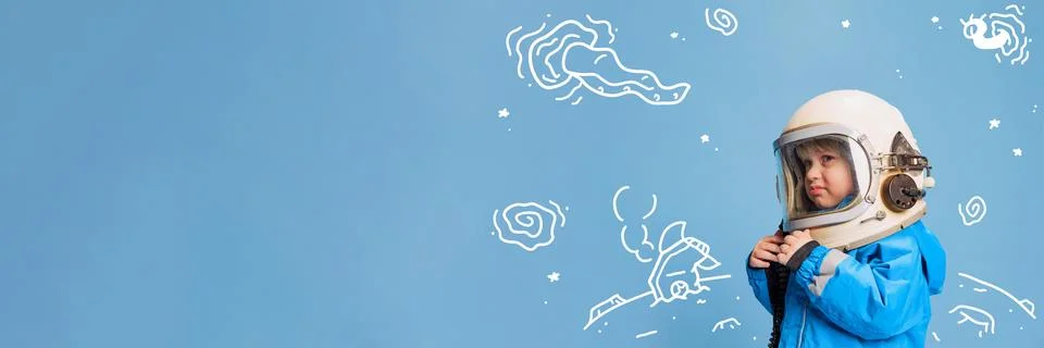 Creative design with drawn elements. Portrait of little boy, child in costume of Stock Photos