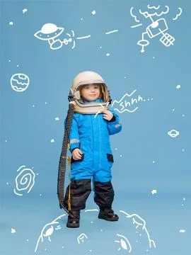 Creative design with drawn elements. Portrait of little boy, child in costume of Stock Photos