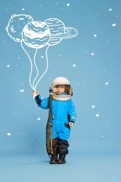 Creative design with drawn elements. Portrait of little boy, child in costume of Foto stock