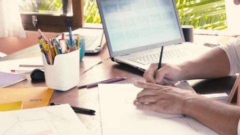 Creative design men develop ideas and looking laptop Stock Footage 73131892