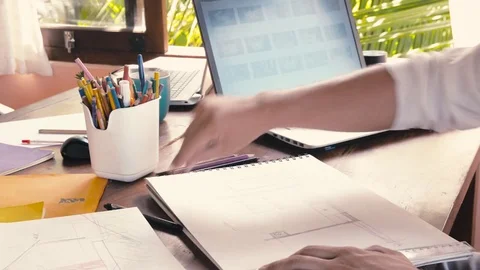 Creative design men develop ideas and looking laptop Stock Footage 73132421