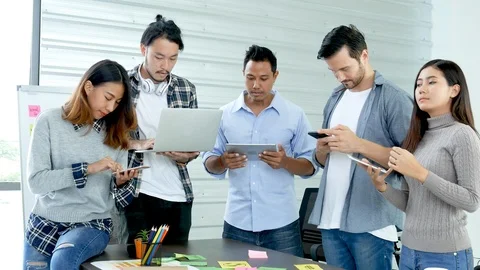 Creative design office center working teamwork. Happy business people partner pl Stock Footage 124297604