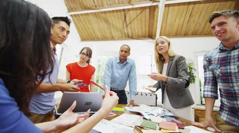 Creative design team brainstorming in a business meeting Stock Footage 31907802