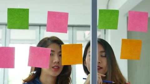 Creative design woman present talking use sticky notes post, present ideas. Dive Stock Footage 159845408