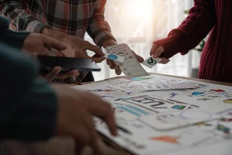 Creative designer choosing color samples for mobile responsive website Stock Photos