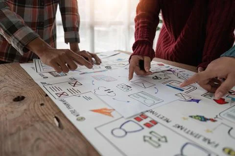 Creative designer choosing color samples for mobile responsive website Stock Photos
