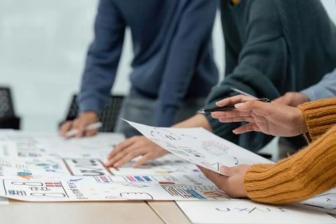 Creative designer choosing color samples for mobile responsive website Stock Photos