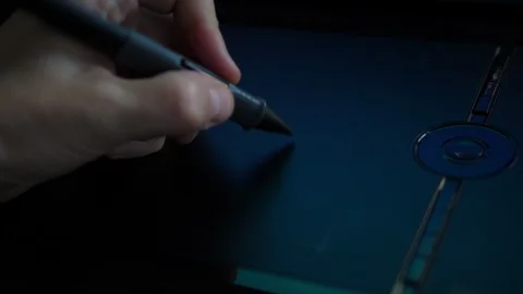 Creative Designer drawing with Pen on digital graphic Tablet. POV Close up Hand Stock Footage 118279955