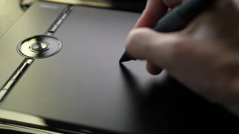Creative Designer drawing with Pen on digital graphic Tablet. POV Close up Hands Stock Footage 118313573