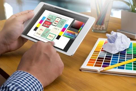 Creative Designer Graphic at work. Color swatch samples, Illustrator Graphi.. Stock Photos