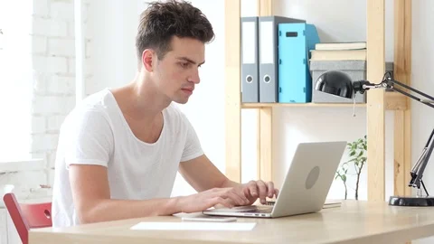 Creative Designer Typing On Laptop in Office Stock Footage