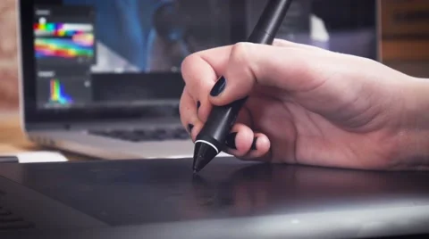 Creative designer working on project using the tablet and stylus Stock Footage 62241484