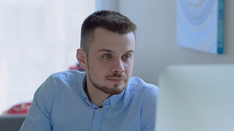 Creative designer works for a large computer at home Stock Footage 104321744